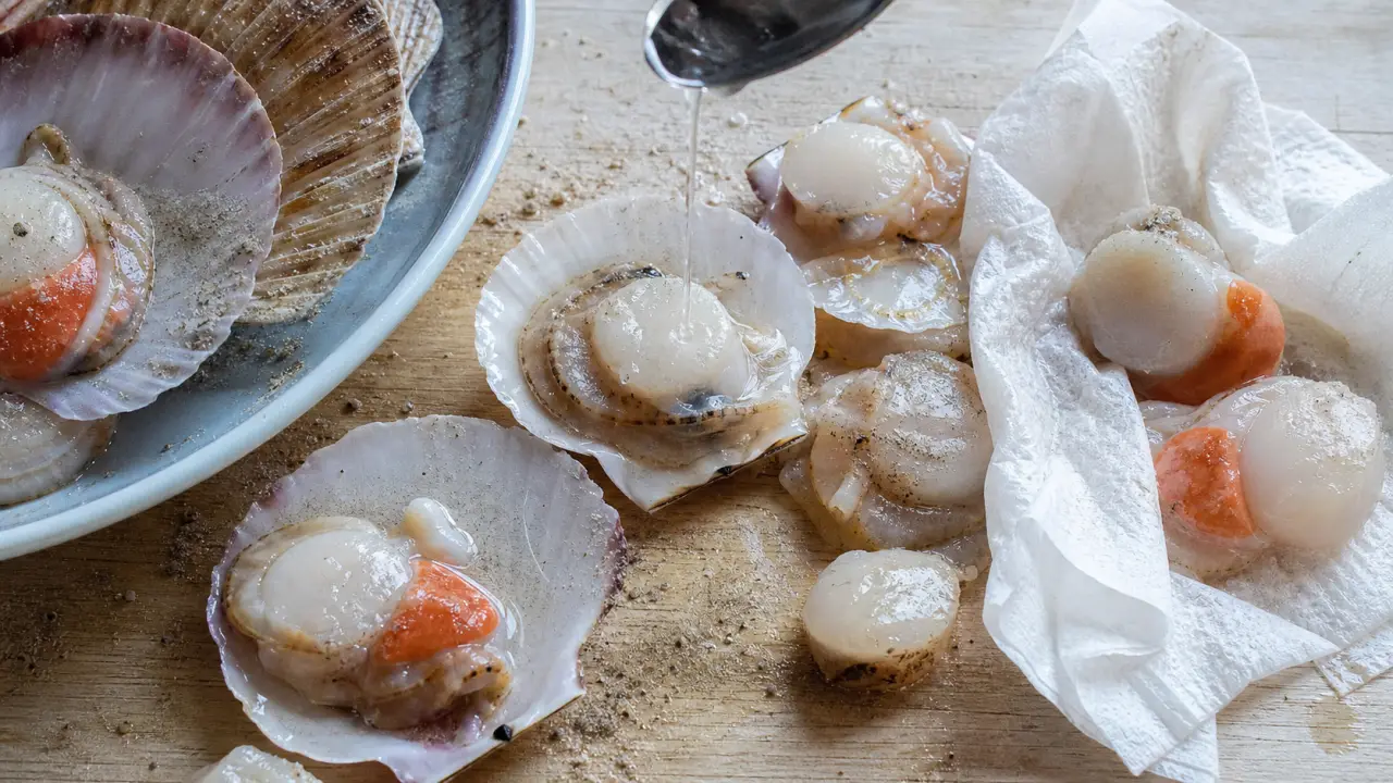 Faut il laver les noix de saint jacques fraiches : sable et corail
